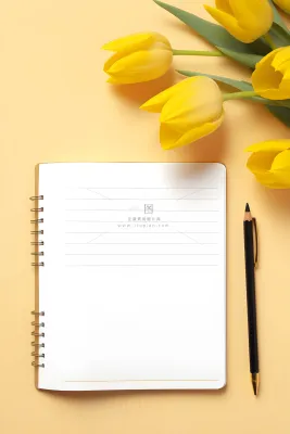 康乃馨黄色纸张笔唯美背景 康乃馨黄色纸张笔唯美背景