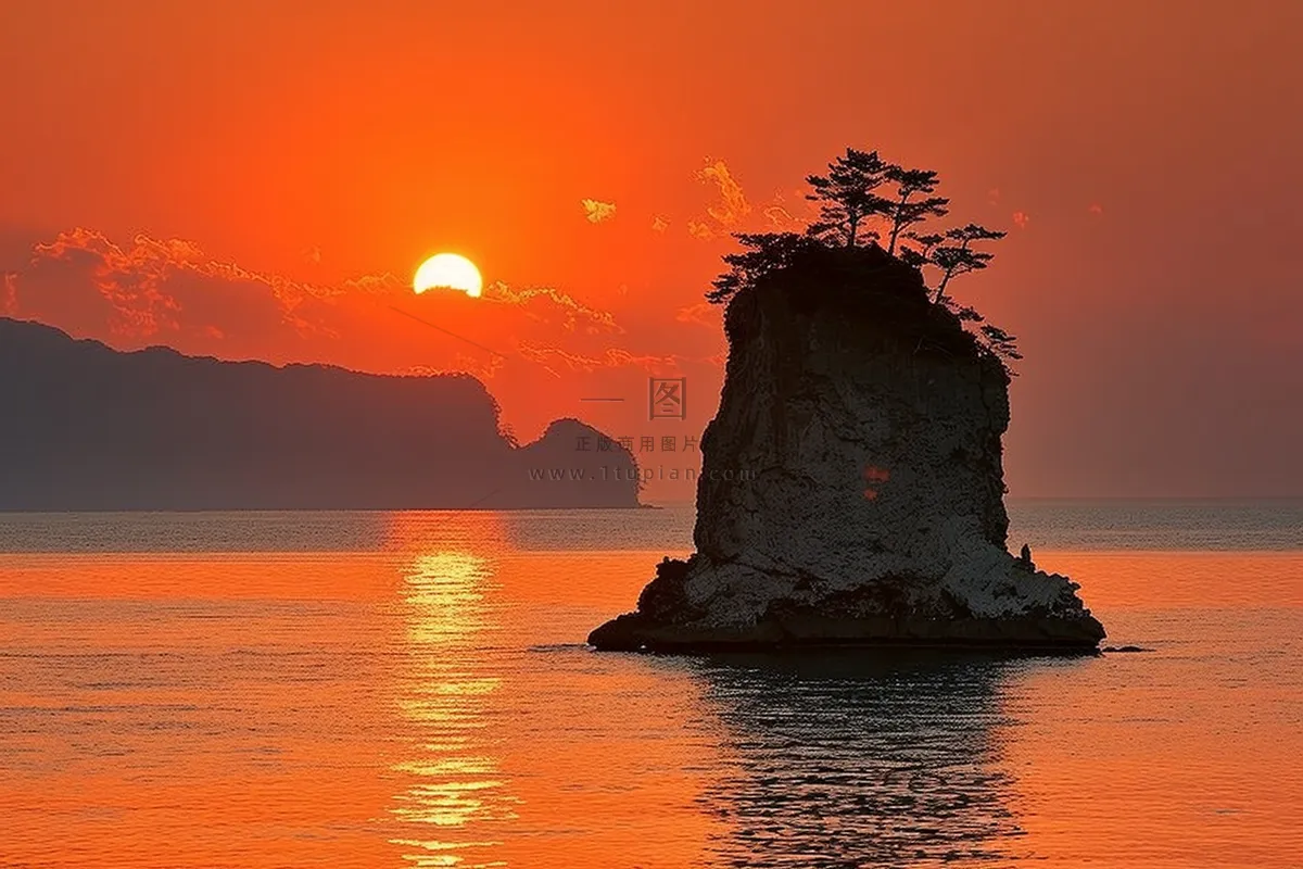 落日海洋沙滩夕阳晚霞摄影图 