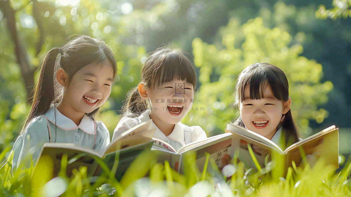 公园草坪看书阅读的学生孩子们知识兴趣世界读书日摄影图