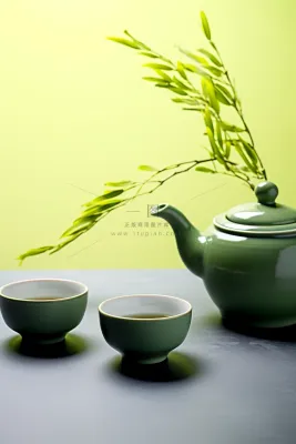 绿色茶壶茶杯植物浅绿背景墙摄影图