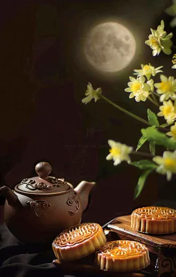 中秋月饼传统糕点美食圆月黄花摆盘精美摄影图