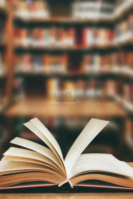 图书馆翻开的书本知识阅读教师节摄影图