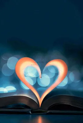 翻开的书本爱心形知识阅读教师节摄影图