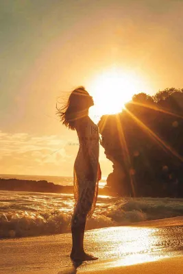 落日海洋沙滩夕阳晚霞摄影图 