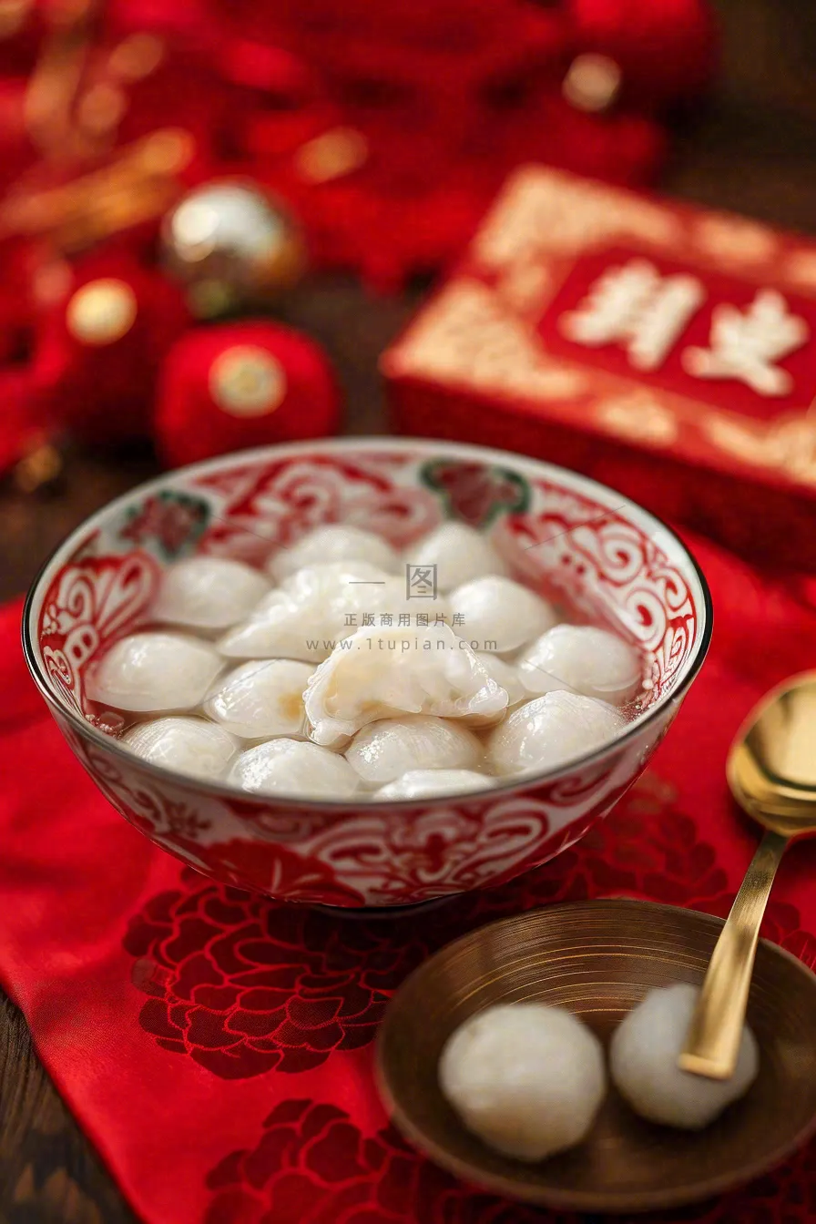 红色节日喜庆背景传统美食汤圆元宵节摄影图