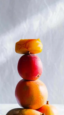 水果柿子苹果番茄芒果光影摄影，简约白色