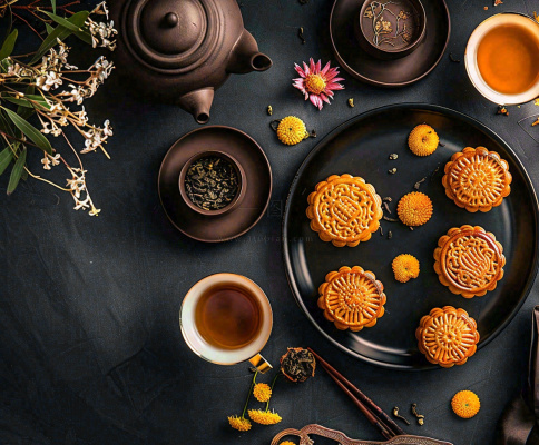 中秋美食月饼中国传统糕点摆盘装饰泡茶摄影图