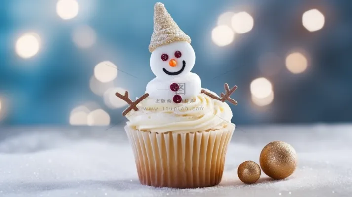 圣诞雪人纸杯蛋糕节日甜点摄影图 圣诞雪人纸杯蛋糕节日甜点摄影图