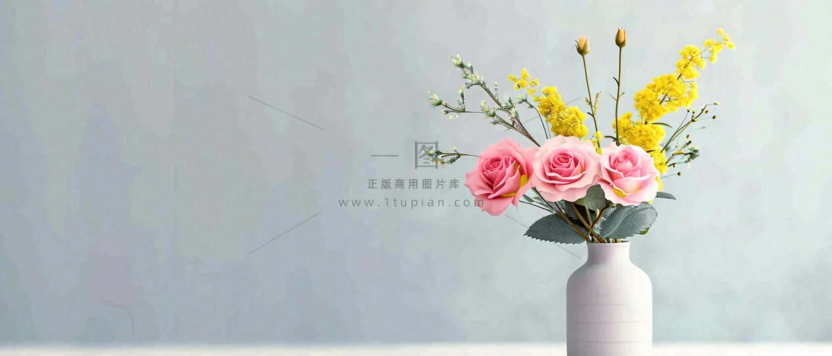 简约的墙面前有一瓶鲜花花束绿植,鲜艳清新新鲜室内装饰摄影图