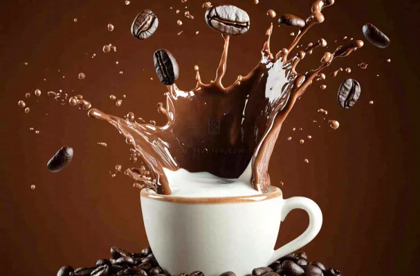 咖啡与牛奶的碰撞水花四溅饮品创意摄影图