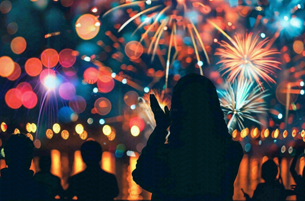 烟花绽放节日人物剪影背景庆祝小年除夕夜背景