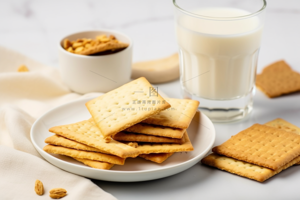 营养早餐苏打饼牛奶坚果摄影图
