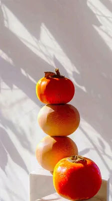 水果柿子苹果番茄芒果光影摄影，简约白色