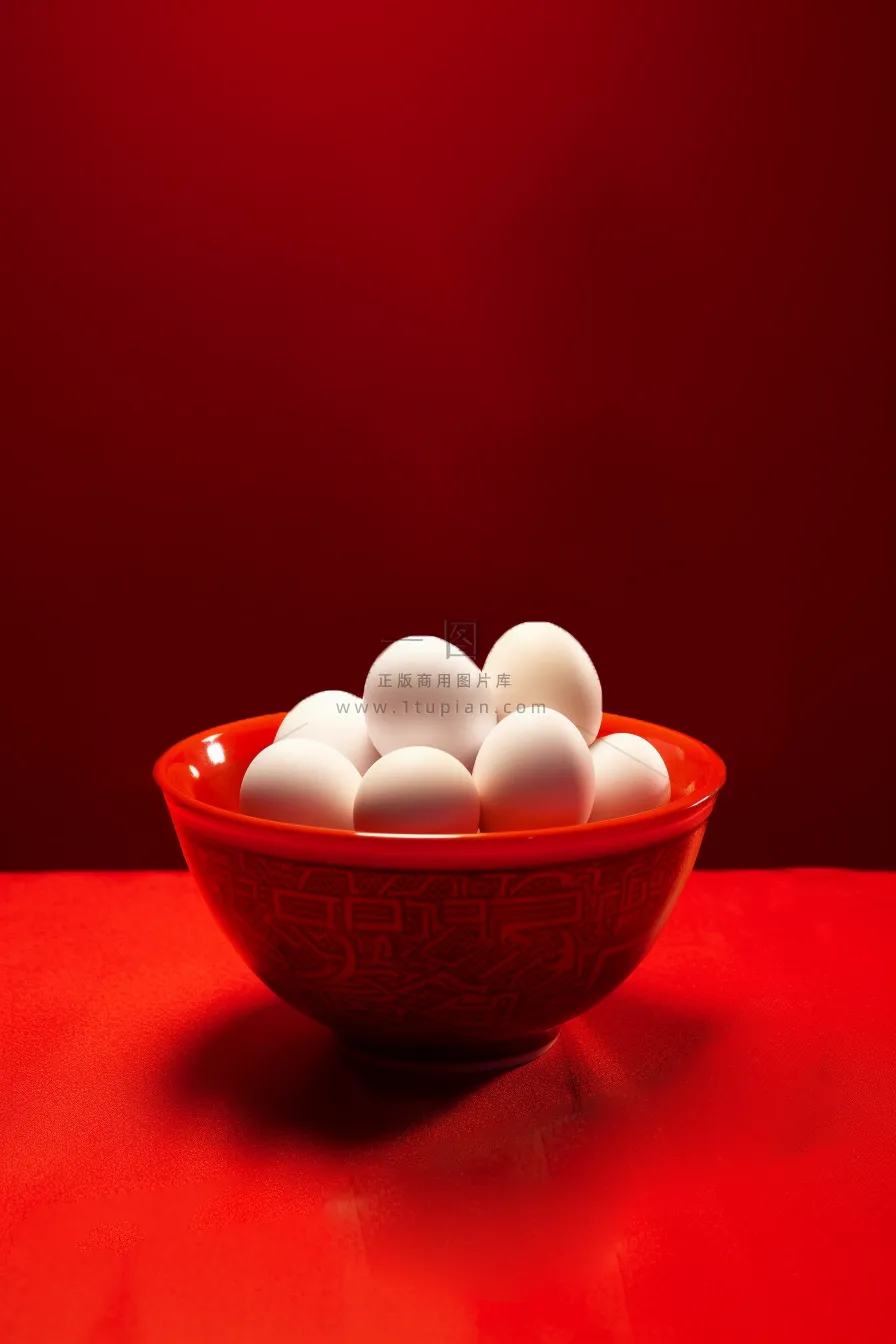 元宵节生汤圆美食红色背景摄影图