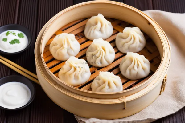 灌汤小笼包美食早点摄影图