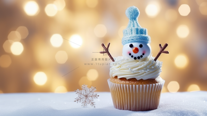 圣诞雪人纸杯蛋糕节日甜点摄影图