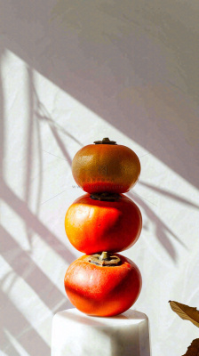 水果柿子苹果番茄芒果光影摄影，简约白色