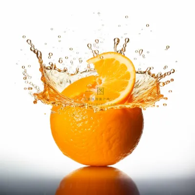 橙子果汁鲜榨果汁水花四溅摄影图