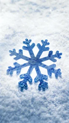 冬季白雪地里的蓝色雪花寒冷大寒小雪大雪摄影图