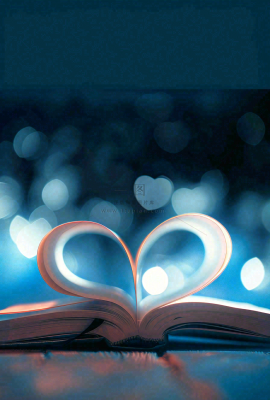 翻开的书本爱心形知识阅读教师节摄影图