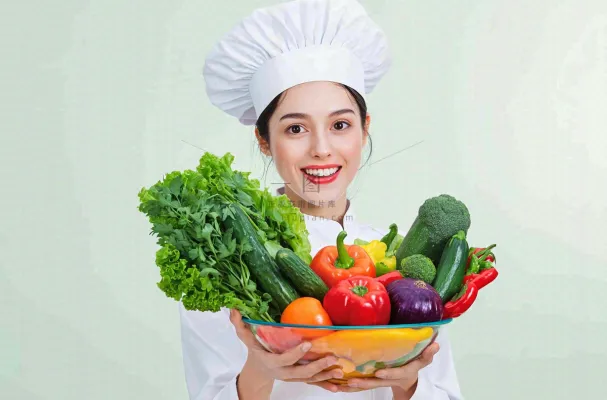 女生厨师抱着蔬菜盆生鲜白色背景摄影图