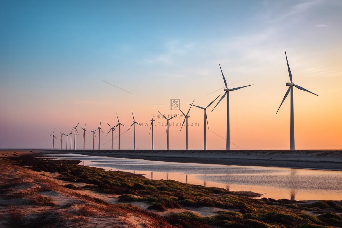 海边日落风车风景摄影图 