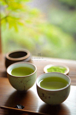绿茶瓷器茶杯品茶摄影图