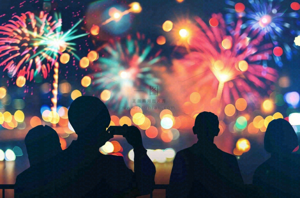 烟花绽放节日人物剪影背景庆祝小年除夕夜背景