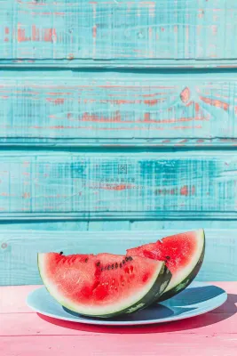 夏日西瓜切块粉蓝木板背景立夏下载小暑处暑摄影图