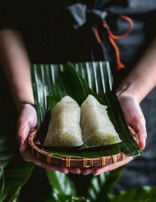 端午节粽子粽叶绿色粽香美食佳节摄影图