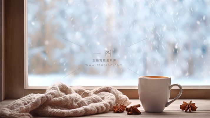冬季窗外下雪白雪飘窗喝咖啡温暖毛衣摄影图